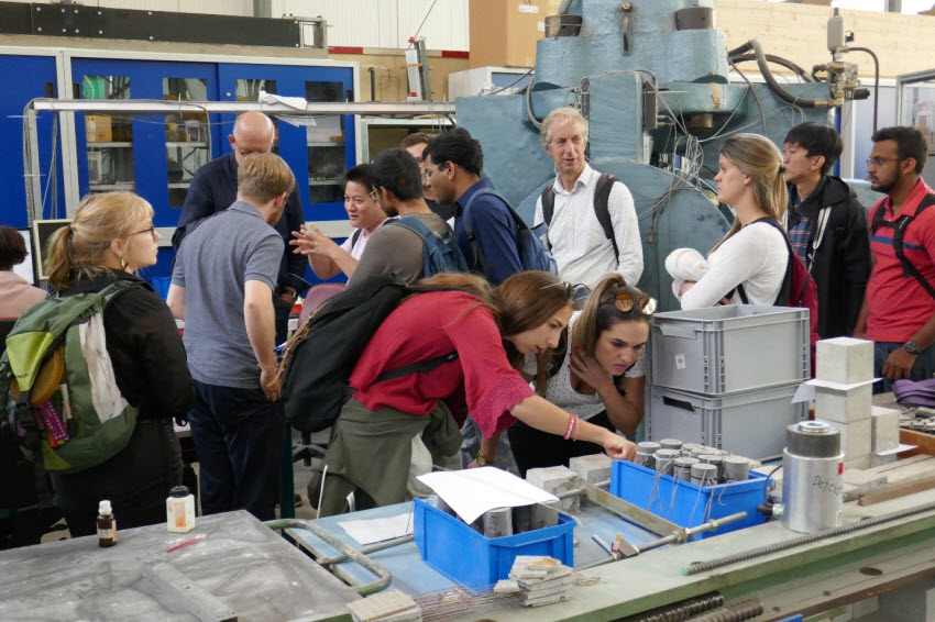 Participants of the GRK 2250/1 International Summer School being guided in the Otto-Mohr laboratory