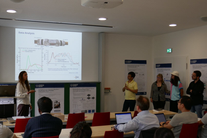 Participants of the GRK 2250/1 International Summer School presenting their experimental findings in teams